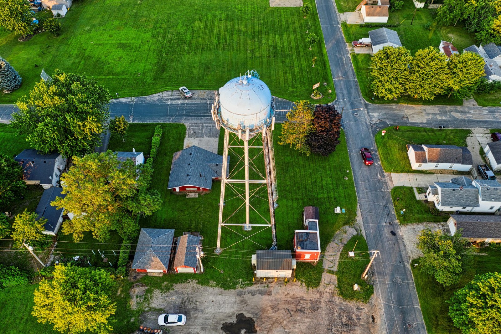 Aerial photograph showing the water tower and nearby residential area in Austin, Minnesota.